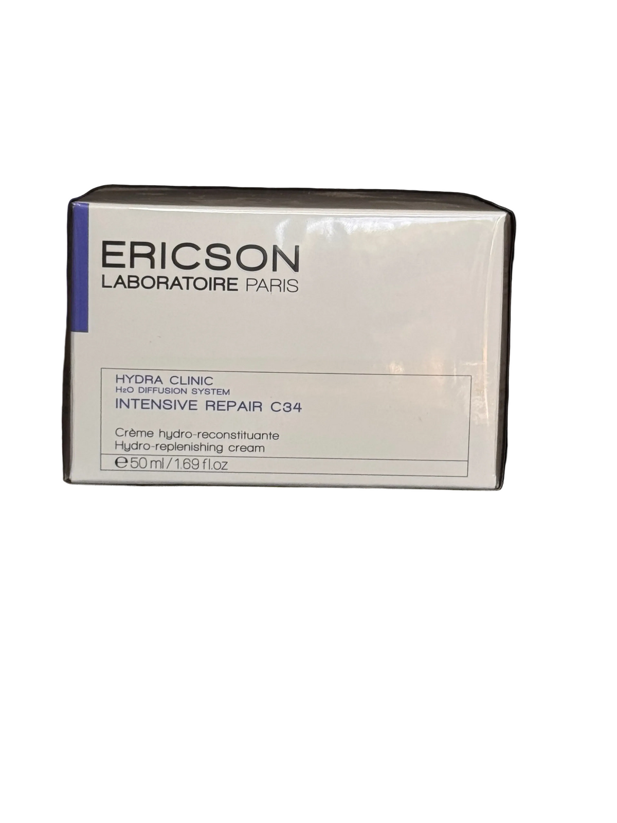 Ericson Laboratoire Paris Hydra Clinic Intensive Repair C34 cream packaging box, shown on a dark textured background.