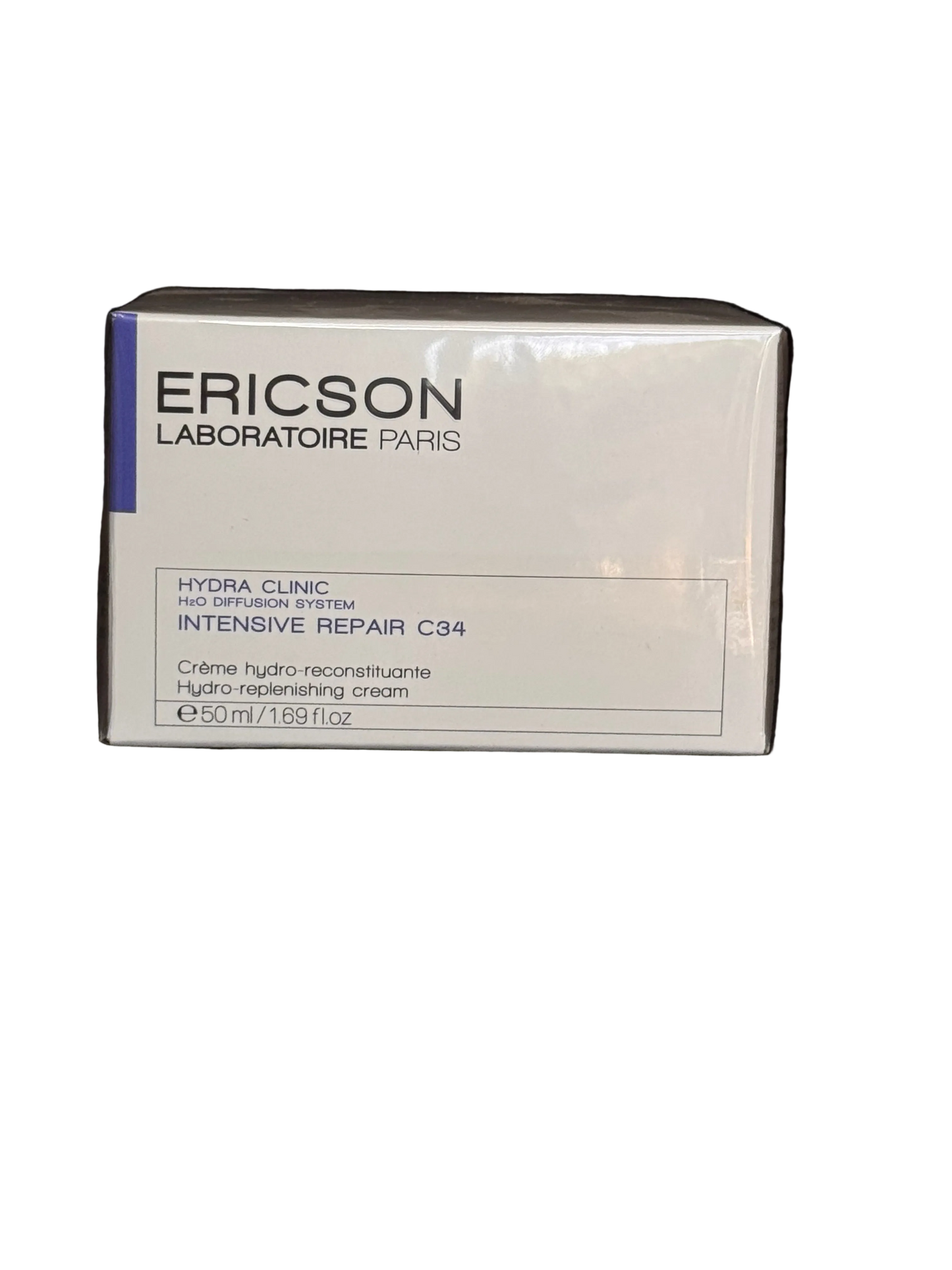 Ericson Laboratoire Paris Hydra Clinic Intensive Repair C34 cream packaging box, shown on a dark textured background.